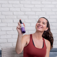 Woman spraying Relax Aromatherapy Mist into the air