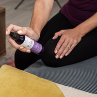 Relax Aromatherapy Mist being sprayed on couch cushion