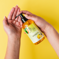 Renew massage oil being pumped into a hand