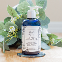 Image of Unscented Almond Massage Oil with plant decorations