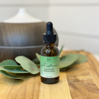 Refresh Essential Oil Diffuser Blend with diffuser in the background